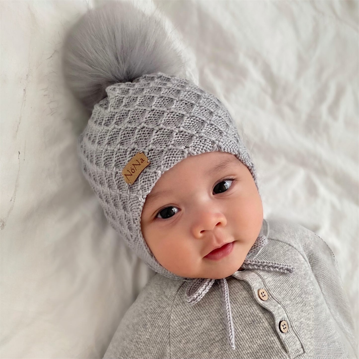 Rún ungbarnahúfa grá